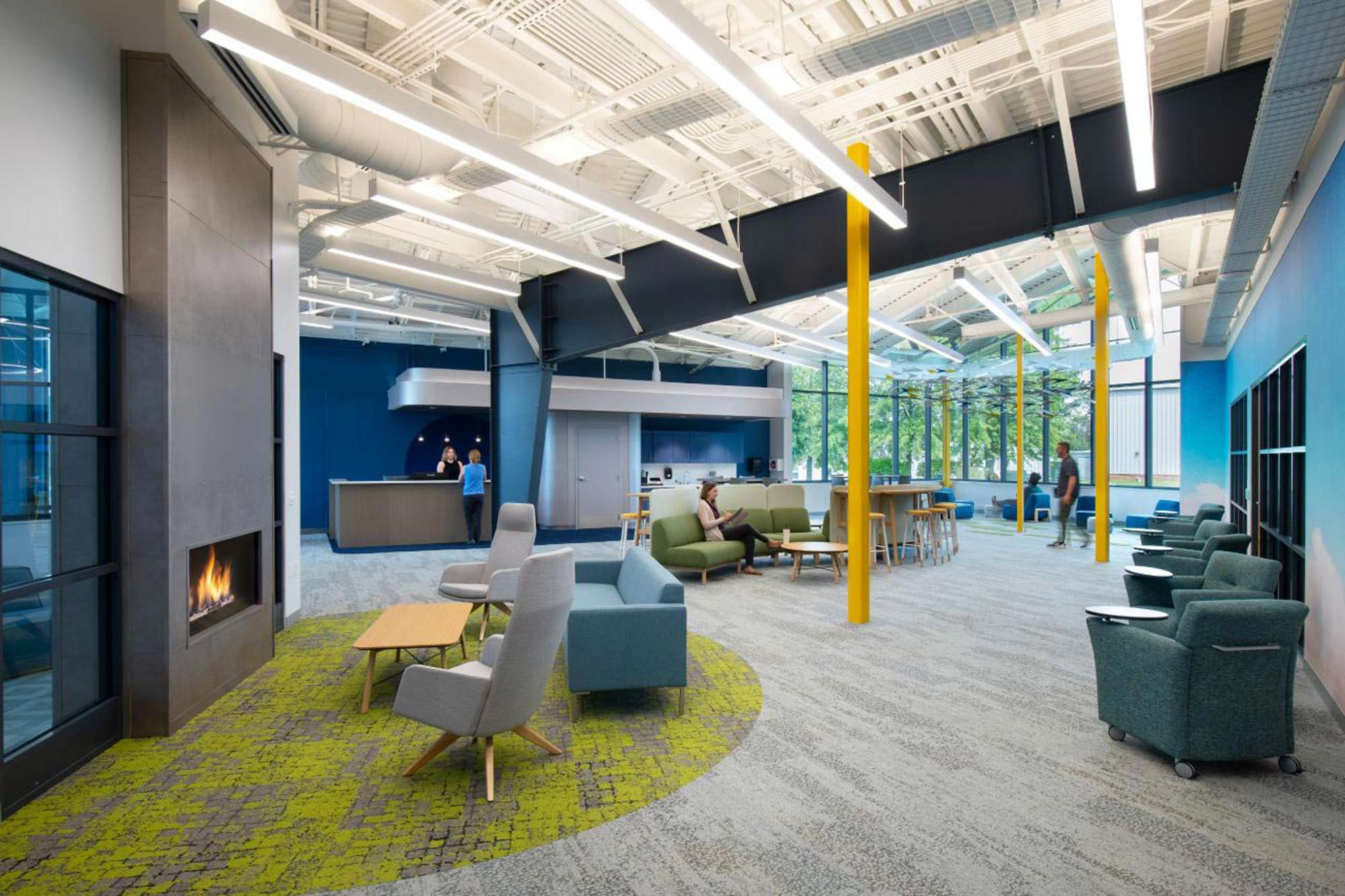 Suspended linear LED lighting installed in a modern open office space