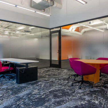 Suspended linear lighting in a corporate office