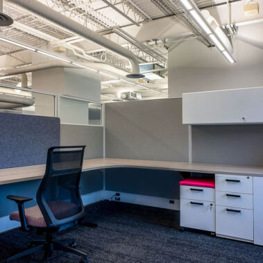 Suspended linear lighting in a corporate office